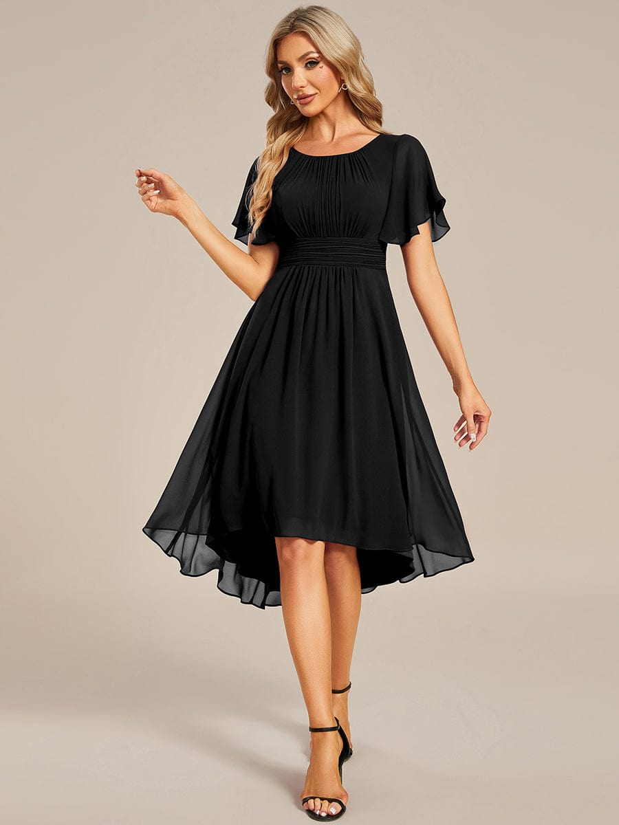 Model wearing a black Weitese flowy chiffon A-line knee-length dress.