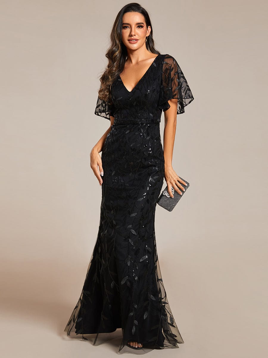 Black leaf-sequined V-neck fishtail gown, front.