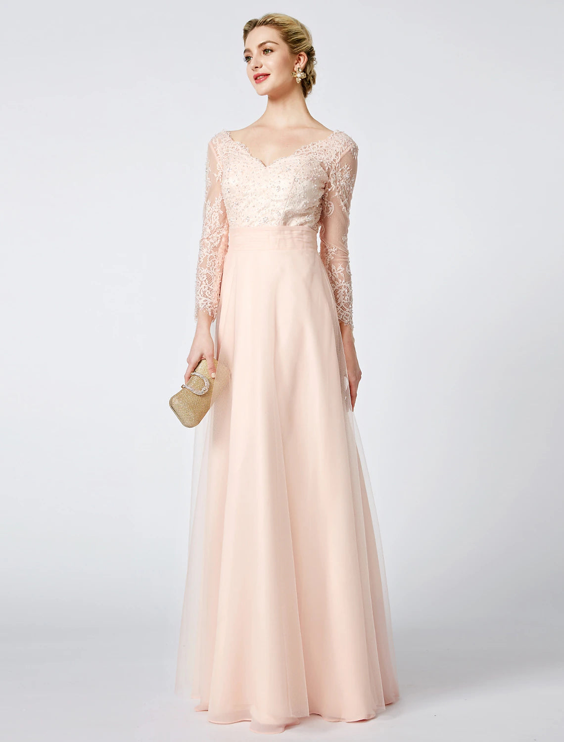 Side view of the elegant pastel ball gown, highlighting the flowing tulle skirt and long sleeves.