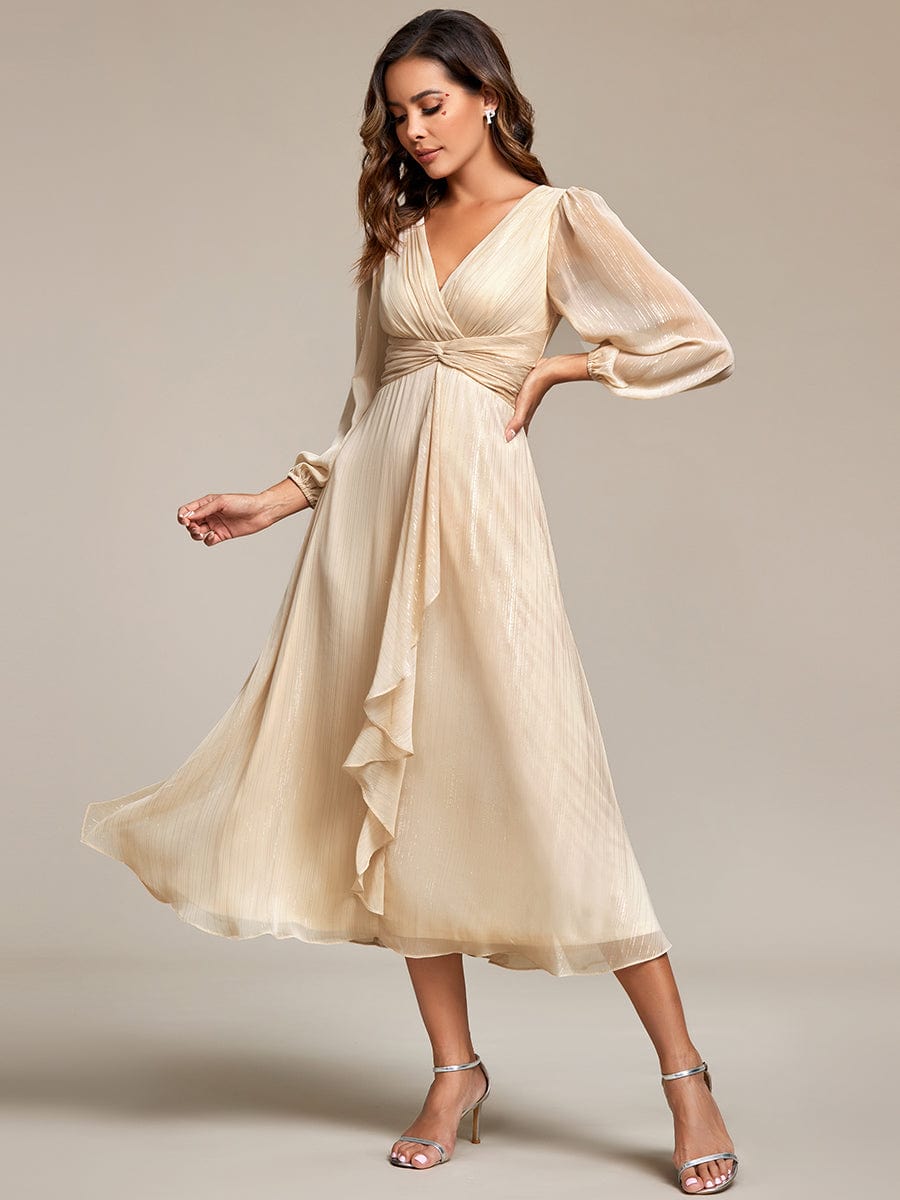 Full length view of a model in the champagne Weitese shimmering evening dress.