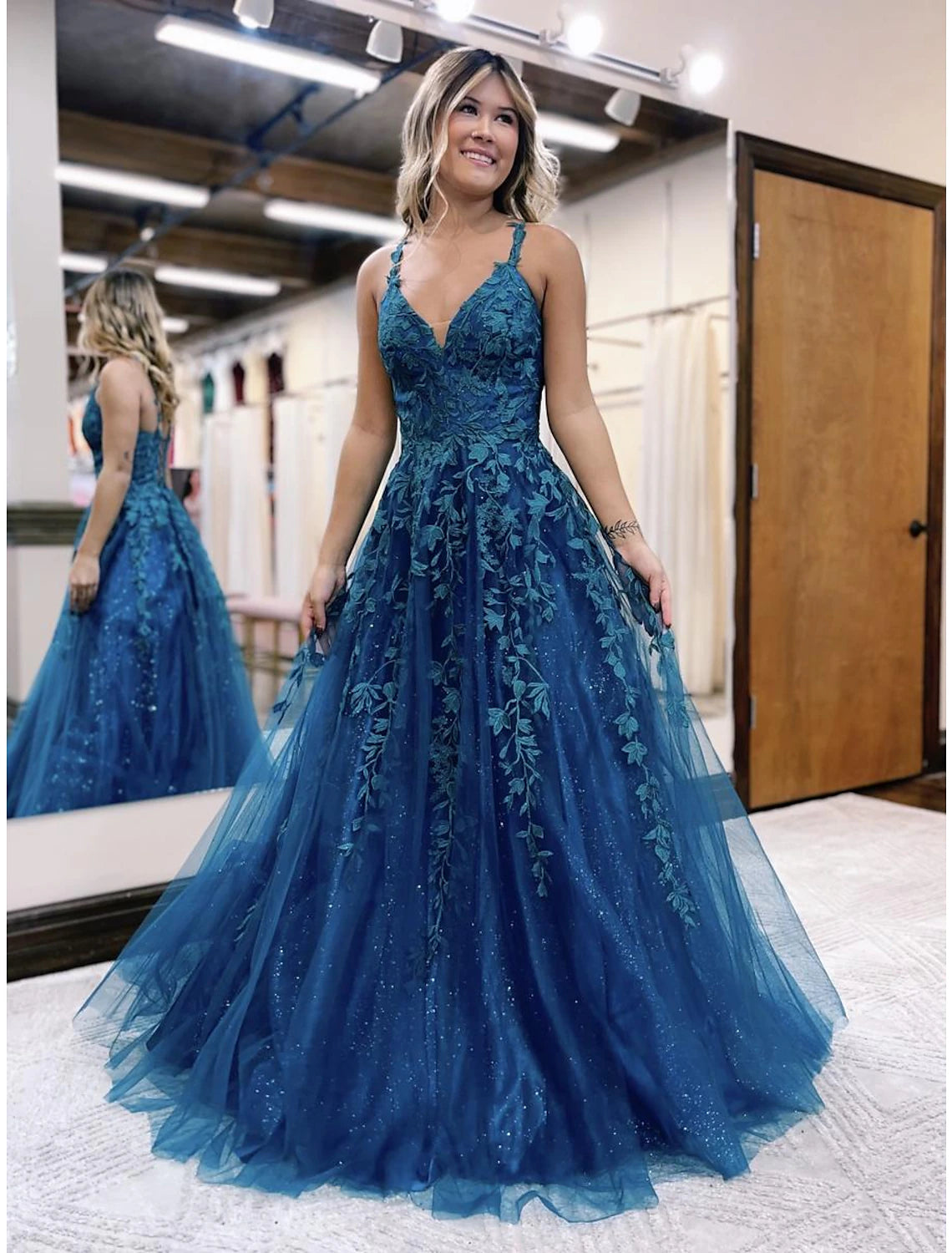 Weitese sparkling A-line ball gown prom dress with V-neck and glitter appliques.
