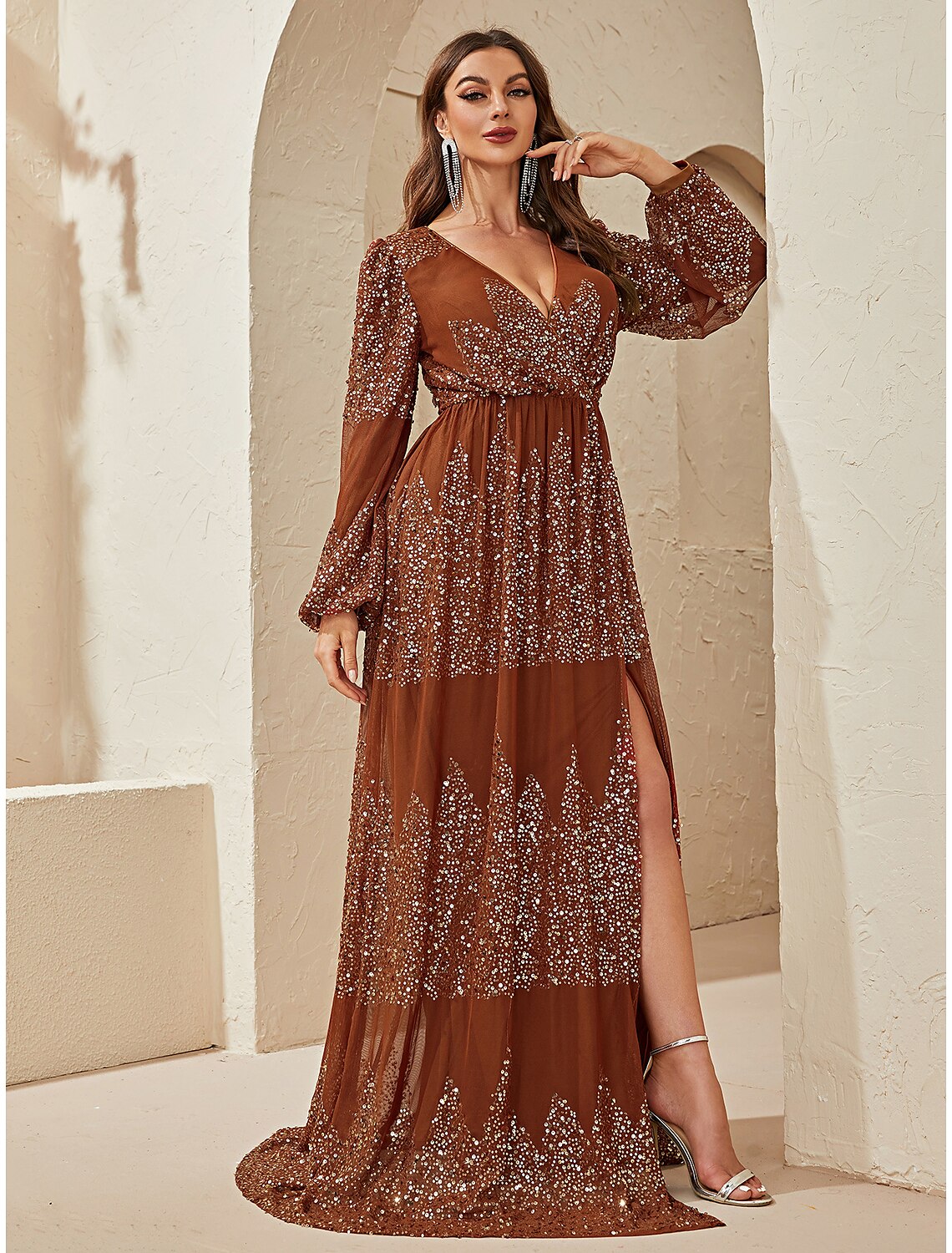 Back view of the A-line gown, showing the sweep train and overall silhouette.