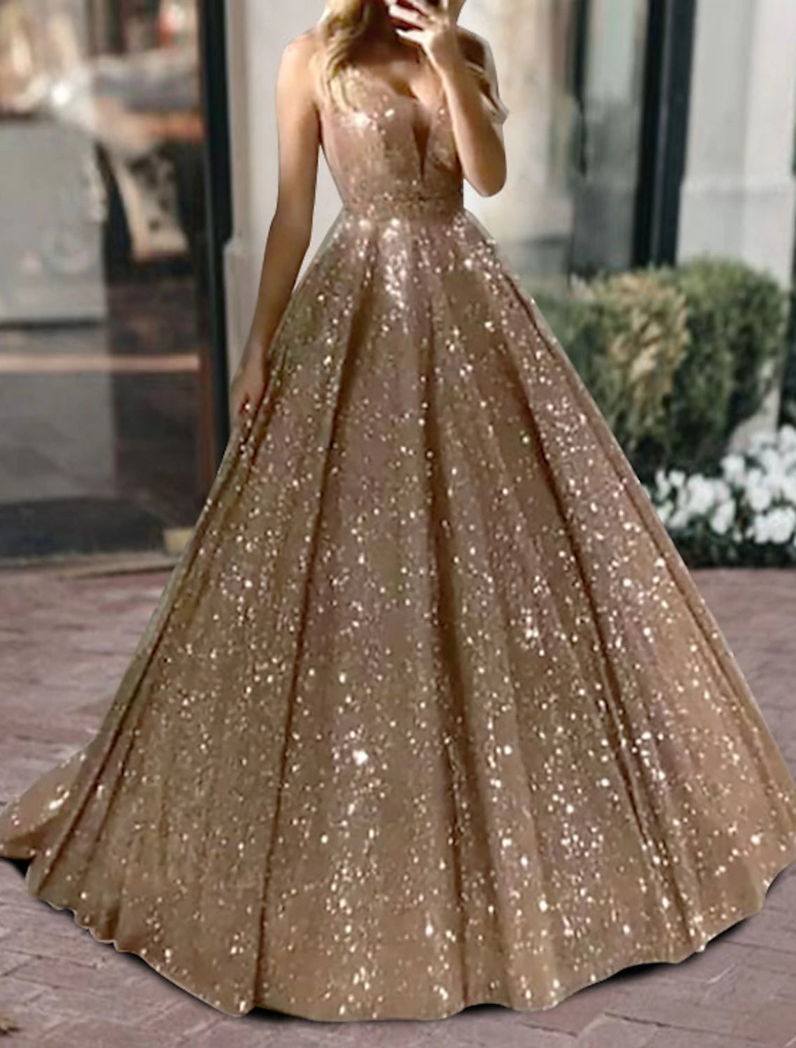 Weitese sparkling black ball gown, front view.