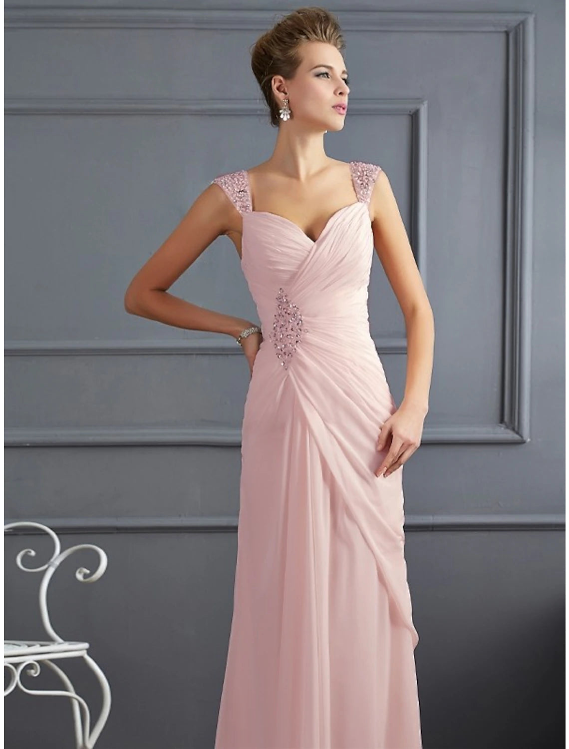 Close-up of the sparkling rhinestones and ruched chiffon on the Weitese evening gown.