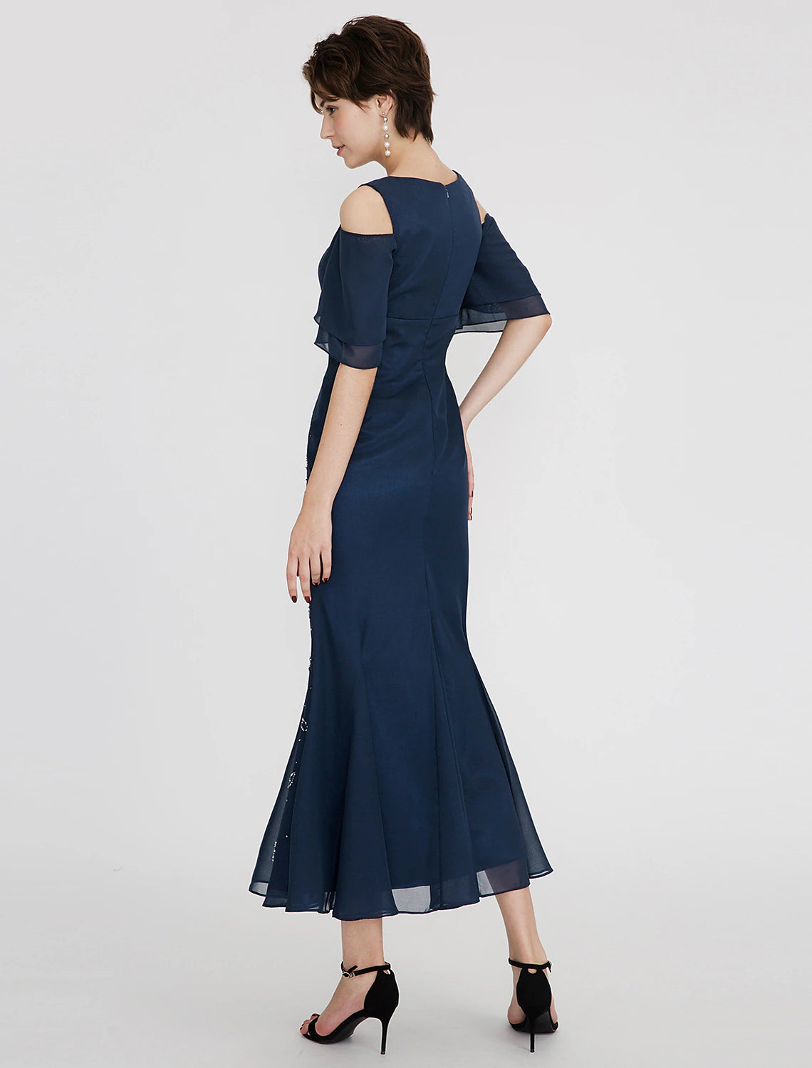 Side view of the Weitese sparkling mermaid trumpet cocktail dress.