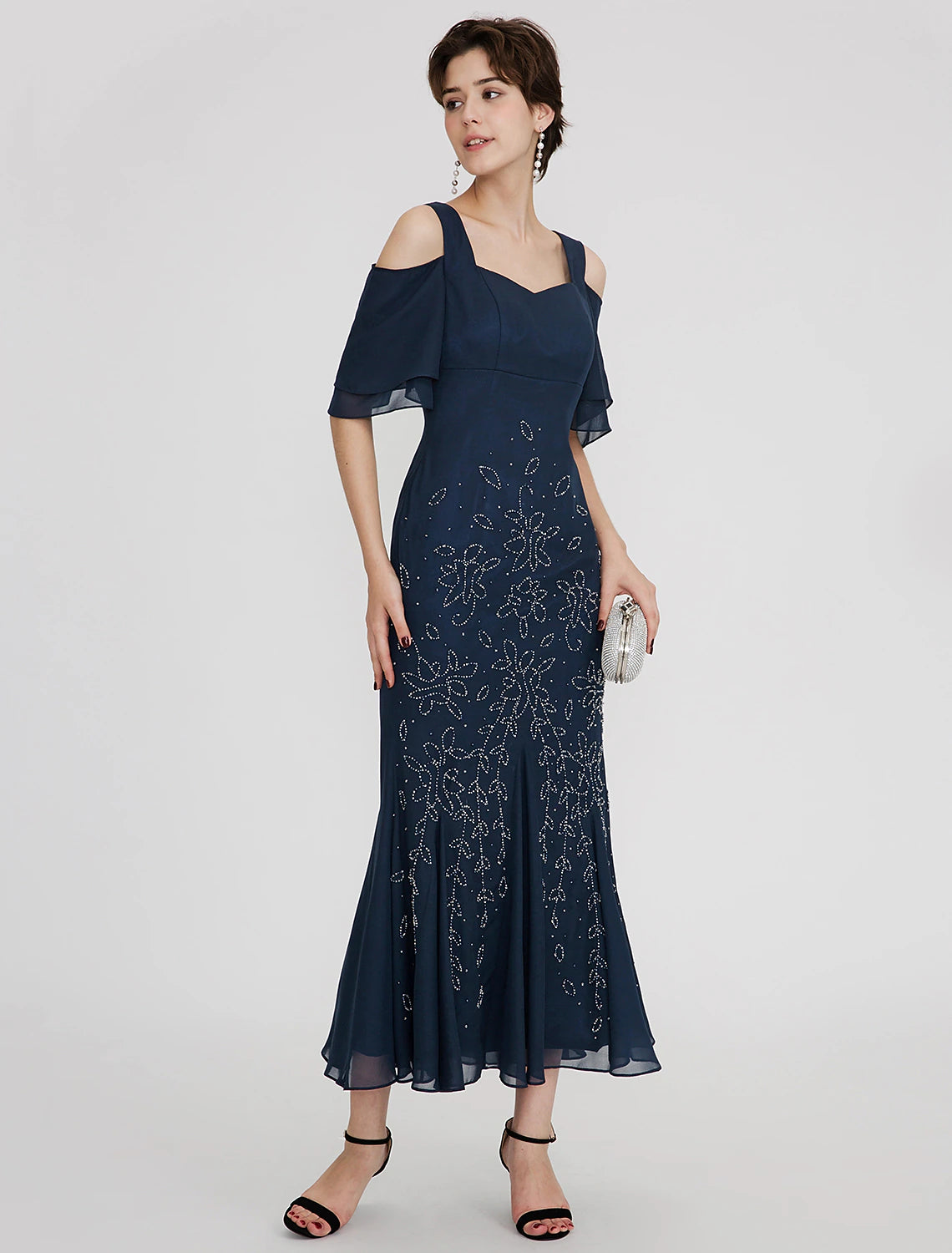 Close-up of the sparkling bodice and straps on the Weitese cocktail dress.