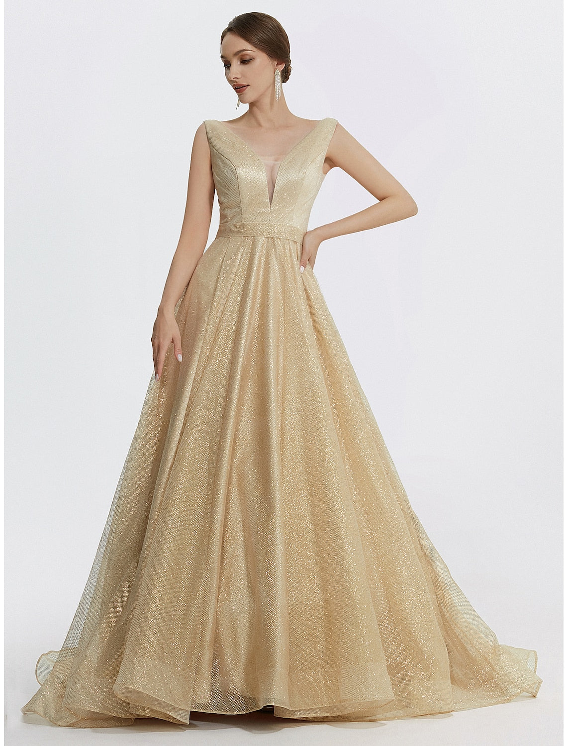 Close-up of the V-neckline and glitter tulle fabric of the formal gown.