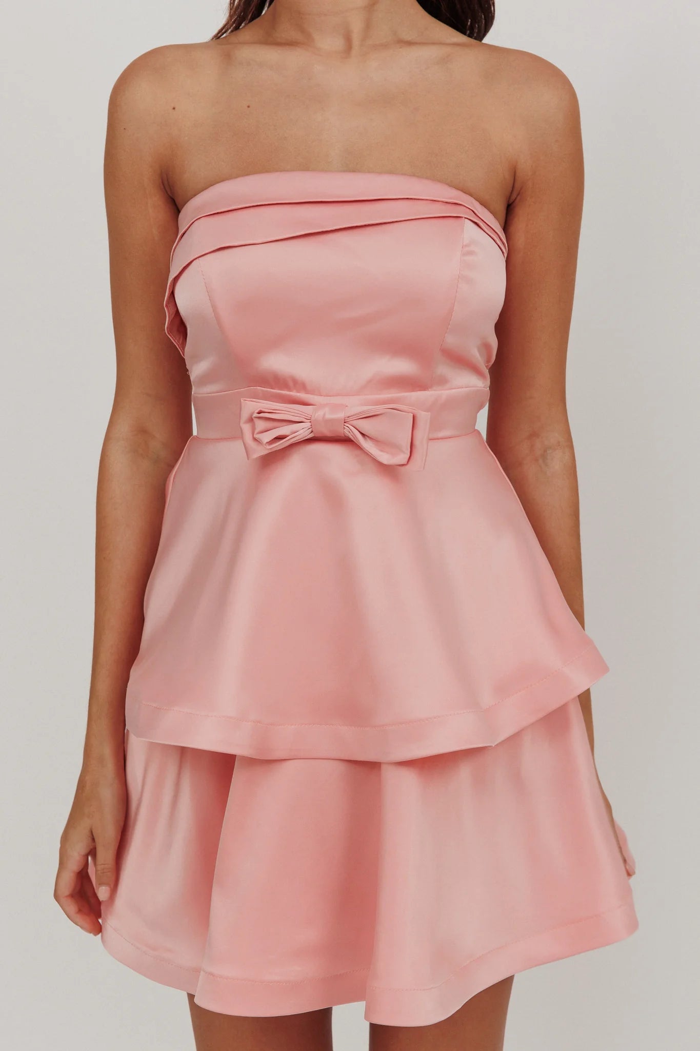 Weitese Dress Chic Pink Satin Mini Dress with Strapless Tiered Dress Bow Waist Detail and Flowy Hem Homecoming Dress