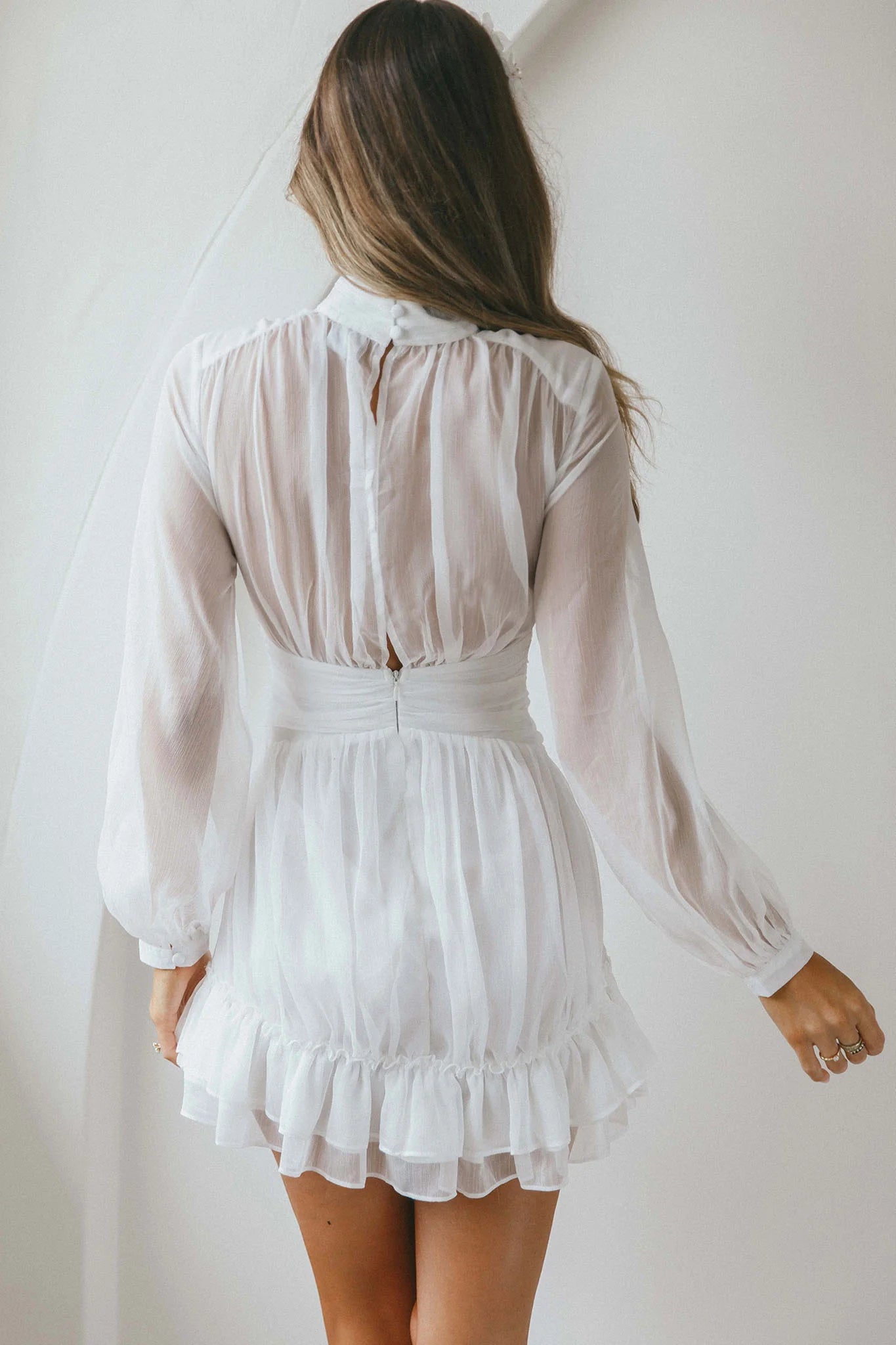 Weitese Dress Elegant White Sheer Dress High Neck Bishop Sleeve Detail Ruffled Hem and Mini Length Homecoming Dress
