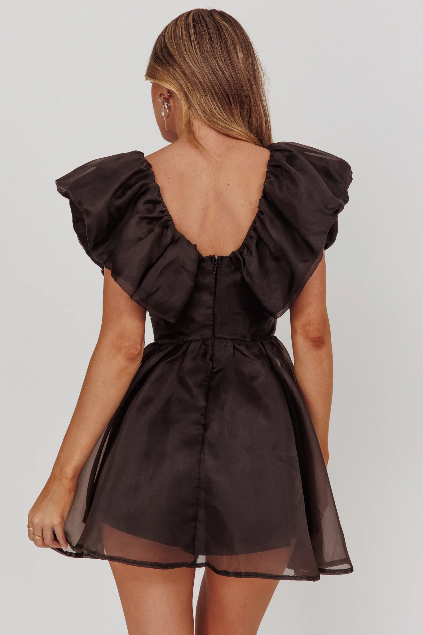 Weitese Dress Sophisticated Black Organza Mini Dress Featuring Sweetheart Neck Ruffled Cap Sleeves Flared Skirt and Sheer Finish Homecoming Dress