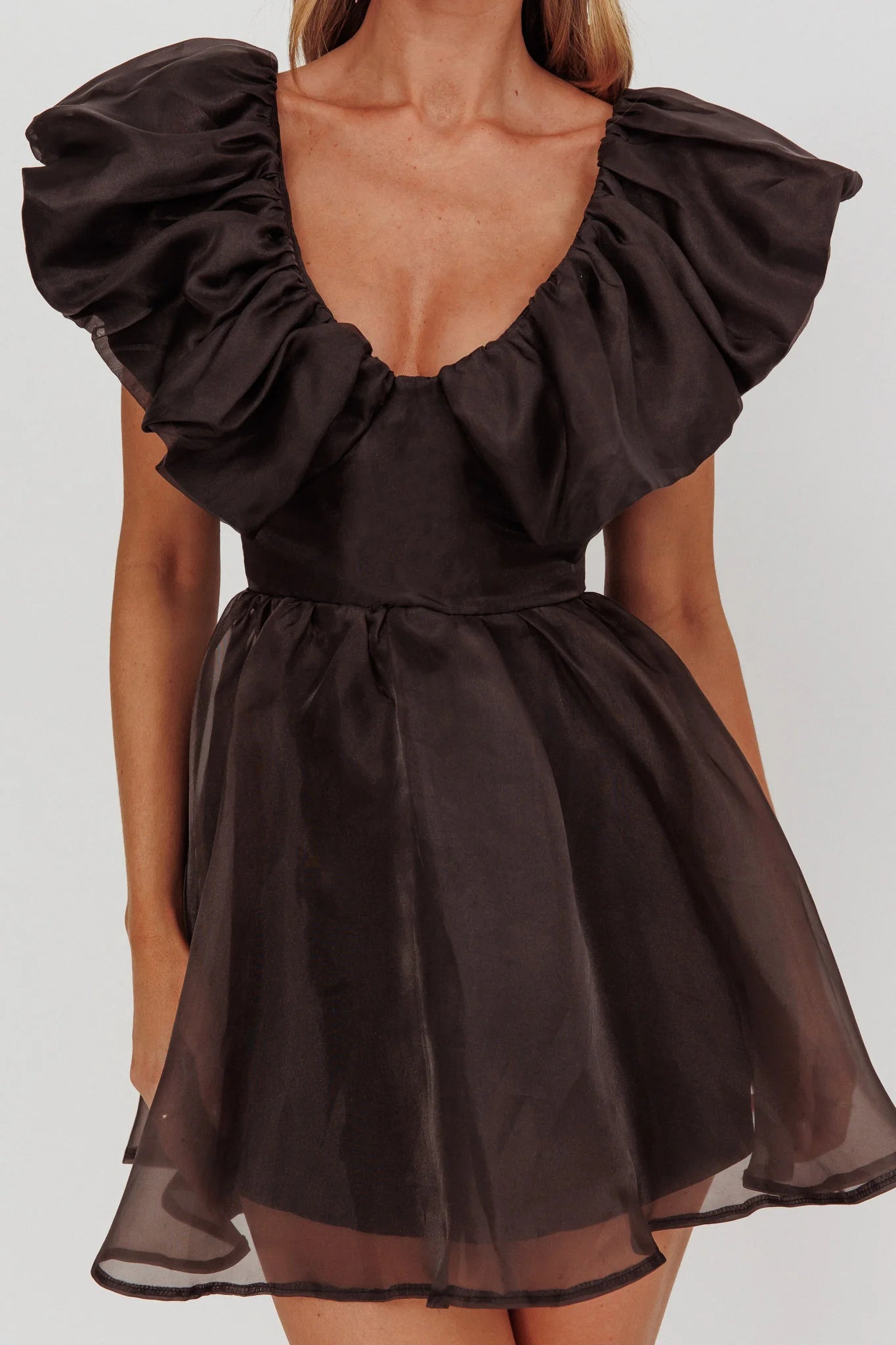 Weitese Dress Sophisticated Black Organza Mini Dress Featuring Sweetheart Neck Ruffled Cap Sleeves Flared Skirt and Sheer Finish Homecoming Dress