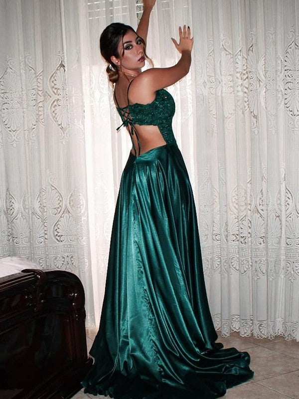 Vestidos de satén con escote en V, sin mangas y cola larga