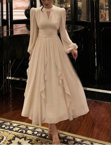 Robe de soirée élégante à volants et manches lanternes, coupe trapèze