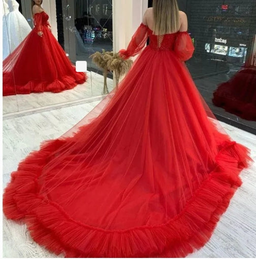 Robe de bal élégante à manches longues et épaules dénudées